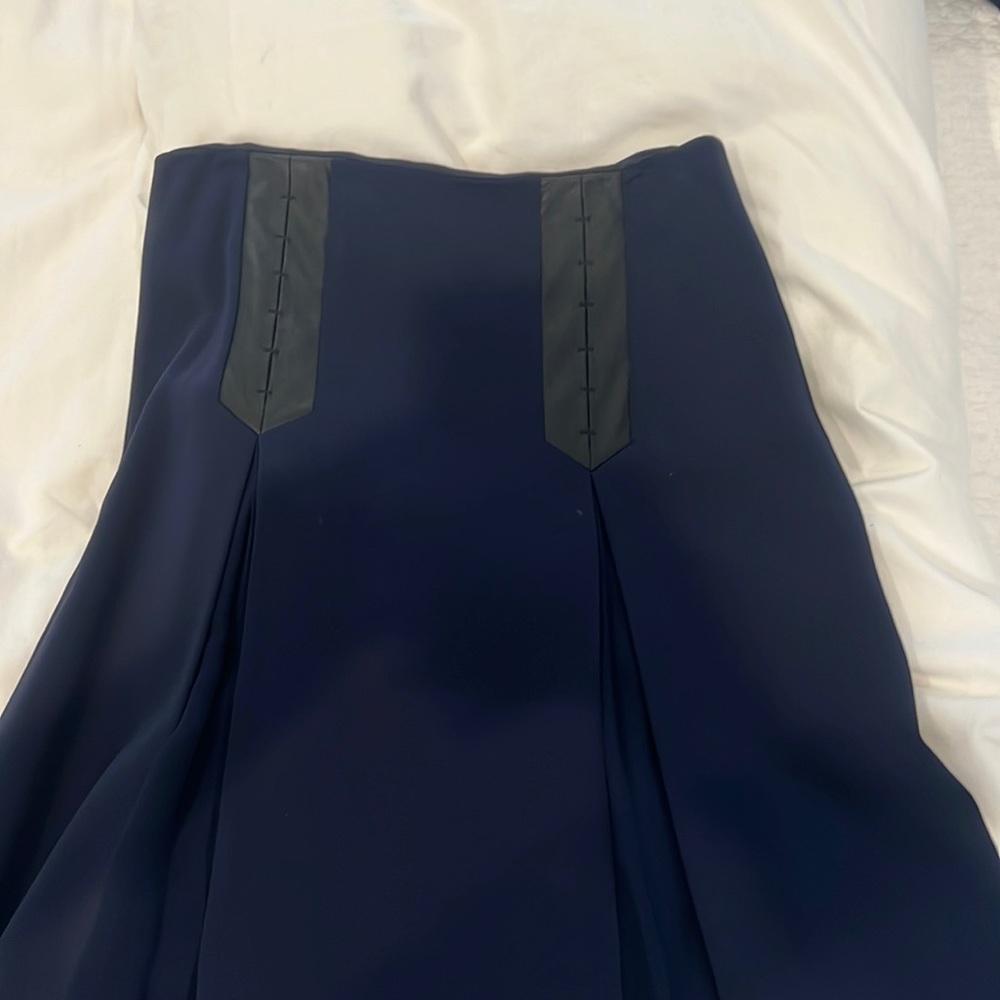 Pleated blue skirt with leather!